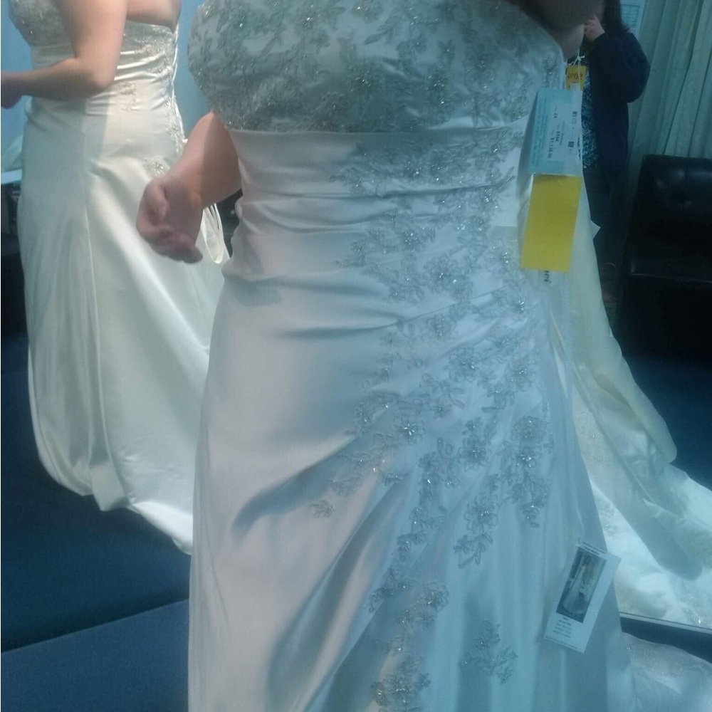Elegant White Strapless Wedding Dress with red accents
